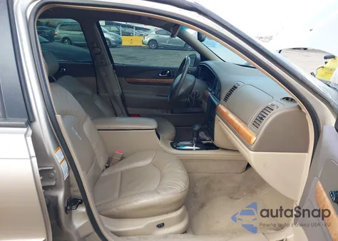 2001 Lincoln Continental z USA, uszkodzony, nr VIN 1LNHM97V31Y736149